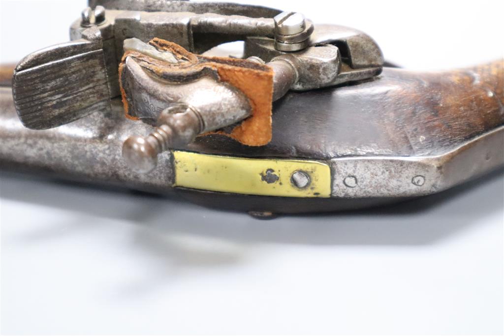 A late 18th century flintlock holster pistol, with walnut stock, 37cm long